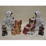 A pair of early 19th century Staffordshire figures of the Cobbler and his wife, and various