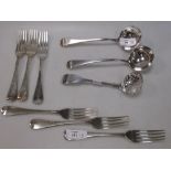 A set of six silver Old English pattern dessert forks, 2 sauce ladles and a sugar sifter