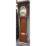 An oak cased longcase clock