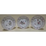 Three 19th century floral painted plates with pierced borders 21cm diameter