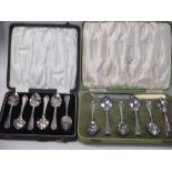 Two cased sets of silver plated spoons, together with a plated stand