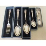 Fox Terrier Prize, three silver spoons and a fork along with two small spoons