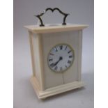 An early 20th century ivory cased carriage clock, with French movement and silver mounts, London