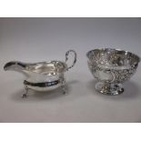 A silver sauce boat, Sheffield 1909 and a small Edwardian sugar bowl, London 1903, 8.36oz (2)