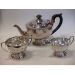 A silver three piece tea service, Birmingham 1931, 29oz