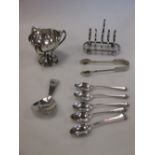 A late Victorian four bar small toast rack, a caddy spoon and small silver 5oz