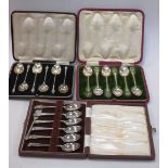 A set of six silver teaspoons by James Dixon and Sons, together with an apostle teaspoon set and