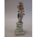 A late 18th/early 19th century pearlware Cupid with doves