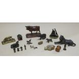 A brass pig vesta, together with a group of Dickensian figures, metal animals, a gavel etc
