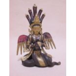 A Tibetan painted bronze goddess figure