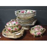 A mid 19th century pink floral and gilt decorated Derby part dinner service