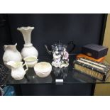 A collection of items to include Belleek, other porcelain and silver and plated items