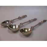 A pair of silver apostle spoons with twist stem, 6oz, and another plated apostle spoon