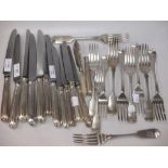 Five George IV, William IV and Victorian silver table forks, two dessert forks, six silver reed