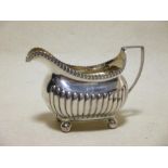 A Georgian silver milk jug