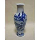 A late 18th century, 19th century Chinese blue and white slender baluster vase, decorated with