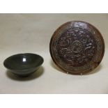 A Chinese glazed lid and a green glazed bowl