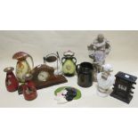 A collection of German fairing figures, vases, date calendar, clock and other items