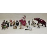 Five Doulton Dickensian figures, a Doulton flambe elephant and a Beswick pottery dog, a Doulton lady