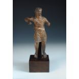 After the antique, an 18th/19th century terracotta figure, he sits wearing a short tunic, his