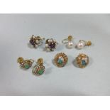 Four pairs of pearl and gemset screwback or clip earrings, the first of pierced flowerhead form