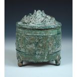 A Han dynasty green glazed jar and mountain cover (boshanlu), the mountain modelled cover resting on