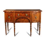 A Regency mahogany bow front sideboard, ebony line inlaid decoration, fitted a central drawer,