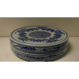 A Chinese blue and white supper dish and cover, the circular lid painted with a band of bats and