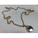A gold belcher link long chain by Unoaerre with pendant swivel fob, the 78cm chain, with London