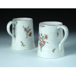 A pair of 18th century Derby mugs, the exteriors moulded with coopered bands and flaring to the