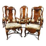 A set of six Dutch walnut floral marquetry dining chairs, and two similar armchairs, with shaped