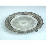 A Victorian silver salver, by Stephen Smith, London 1872, circular with applied cast border with