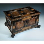 A 17th century German marquetry table casket, the strap hinged lid and front each with two foliage