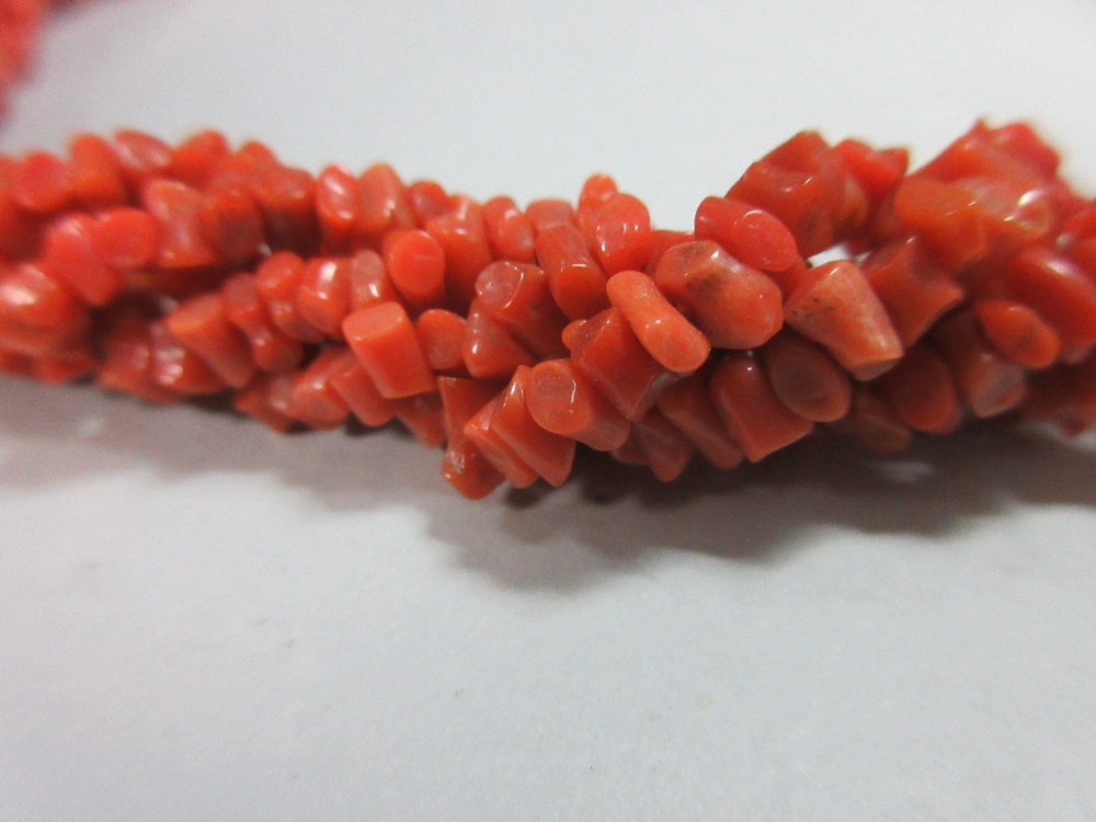 A vintage five strand coral bead necklace, each bead a short length of branch coral, graduated in - Image 2 of 3