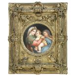 After Raphael, a German porcelain roundel of the 'Madonna della Sedia' in Florentine gilt frame,