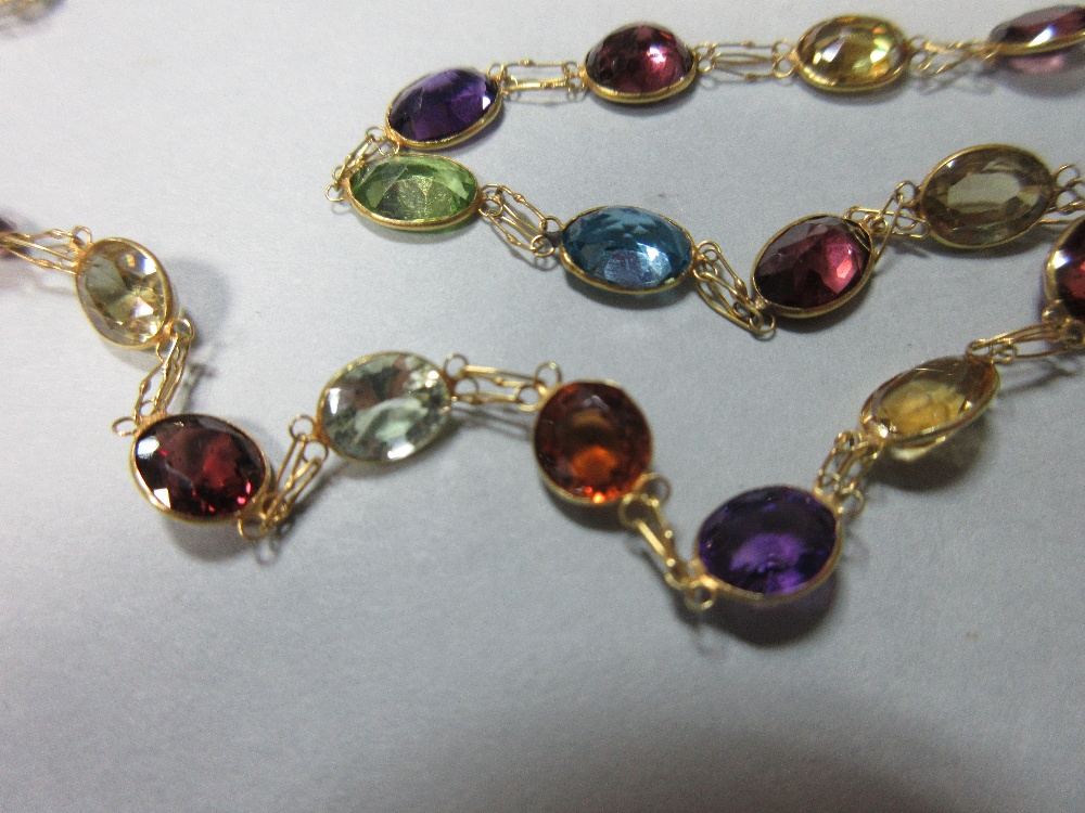 A multi-gemset chain necklace, spectacle set all along with graduated oval and round cut stones, - Image 4 of 4