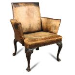 A George II mahogany desk armchair, leather upholstered with brass stud border to the square back