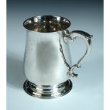 A George II silver pint beer mug, by Richard Gurney & Co, London 1749, of plain baluster form with