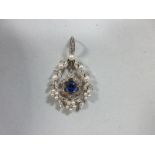 A garland style sapphire, diamond and pearl pendant, with a central indigo coloured cushion cut