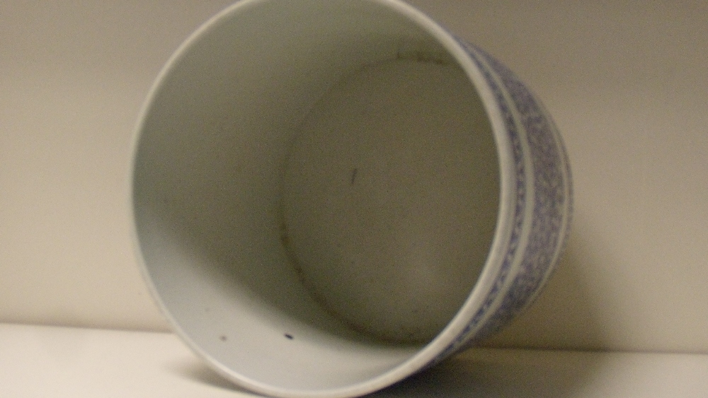 A Chinese overglaze blue brush pot, the exterior rim with a wavy line band above scrolling lotus and - Image 2 of 3