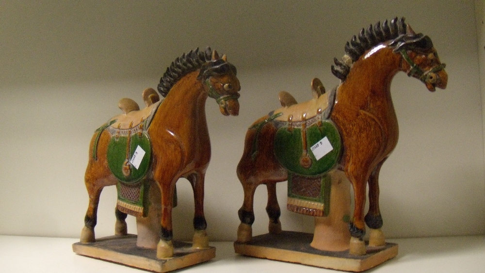 A pair of Chinese sangcai horses, modelled in the Tang taste, the green saddle cloths contrasting - Image 2 of 3