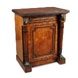 A Regency bronze mounted mahogany and ebonised cabinet, circa 1810, in the manner of George