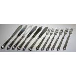 A Victorian set of six pairs of Albany pattern silver bladed fish knives and forks, by James