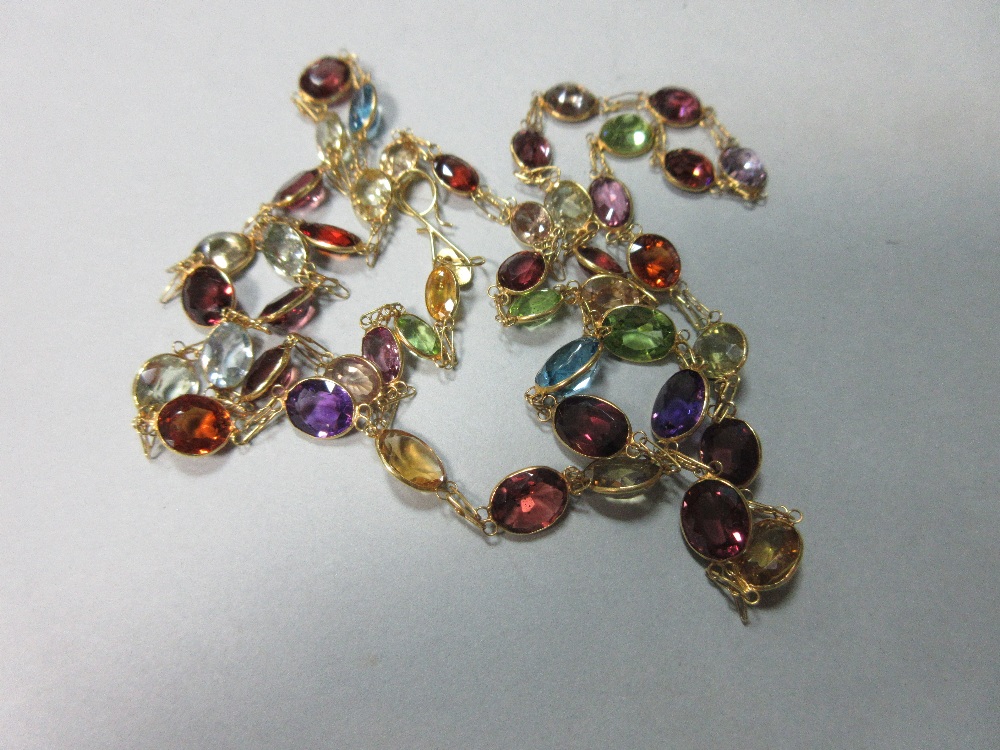 A multi-gemset chain necklace, spectacle set all along with graduated oval and round cut stones, - Image 2 of 4