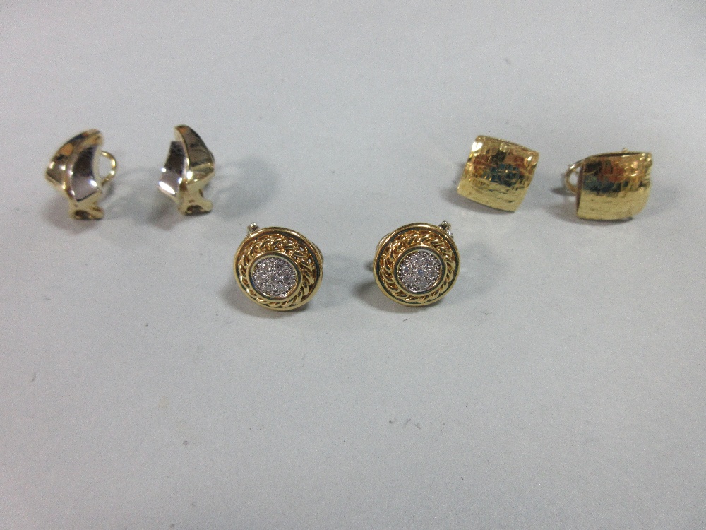 A pair of diamond and bi-coloured 18ct gold earstuds together with two further pairs of 18ct gold