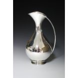 A modern German silver ewer, by Gottlieb Kurz, Schwabisch Gmund, of plain stylised baluster shape