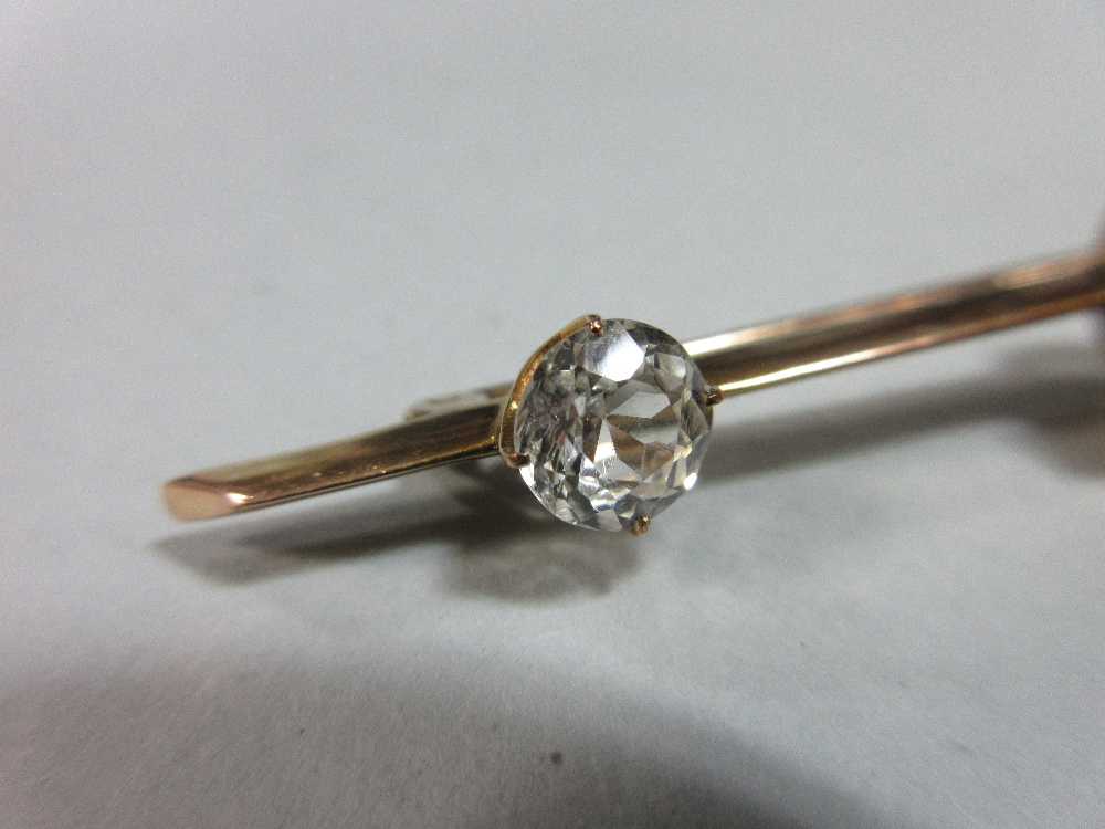 A yellow sapphire and white sapphire bar brooch, claw set to the centre of the knife-edge bar with - Image 6 of 6