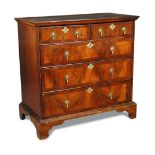 An early 18th century walnut chest of drawers, fitted two short and three long graduated drawers,