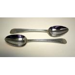 A pair of late 18th century Old English bright cut spoons, by Hester Bateman, London 1782, 21.5cm,