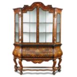 An 18th century Dutch walnut and floral marquetry vitrine, with arched shaped cornice, glazed